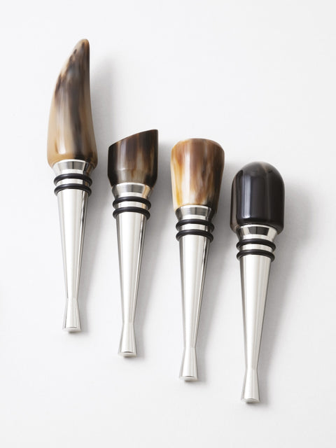 set of four wine stoppers with natural design made in Italy
