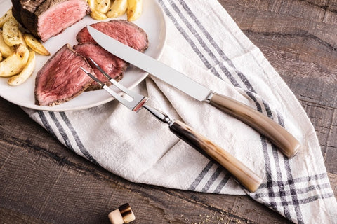 Natural horn luxury cutlery rigorously Made in Italy since 1952. Table cutlery set, fish and shellfish knives, salads server set, truffle slicers, cheese knives set, risotto spoon, roast cutlery, carving set, dessert cutlery, cake serving set