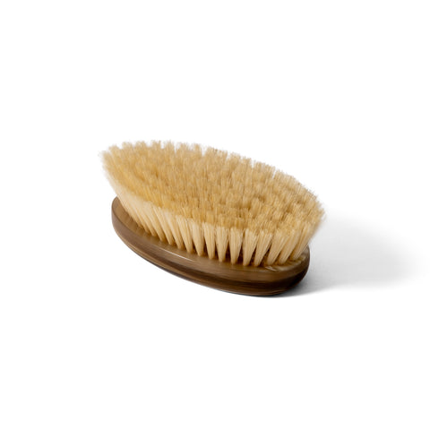 Luxury hair brush in layered natural horn with natural bristles – top view, handmade in Italy gift item.