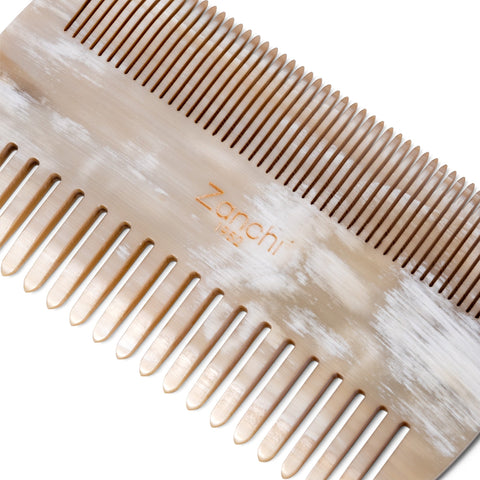 Close-up of luxury handcrafted natural horn layered beard and moustache brush with natural bristles – premium Italian craftsmanship