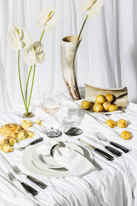 Metropolitan horn cutlery set with black handles and polished stainless steel