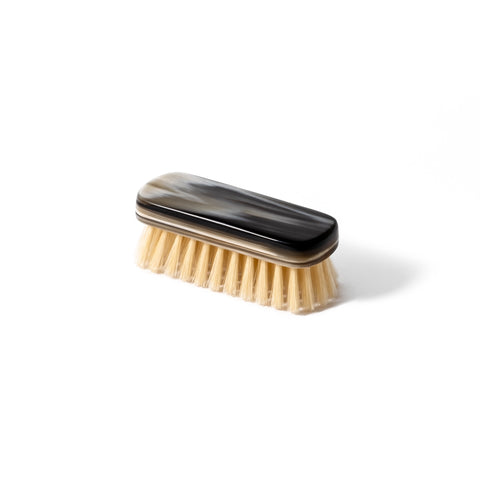 Top view of the natural horn shoe brush with natural bristles, handcrafted in Italy.